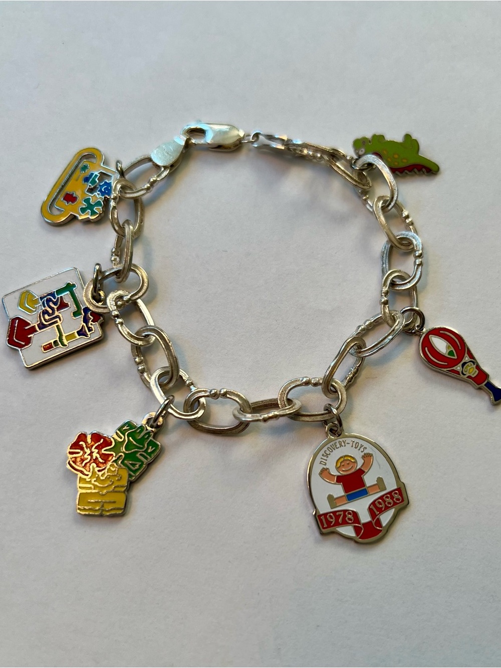 Vintage silver Discovery Toys Charm Bracelet